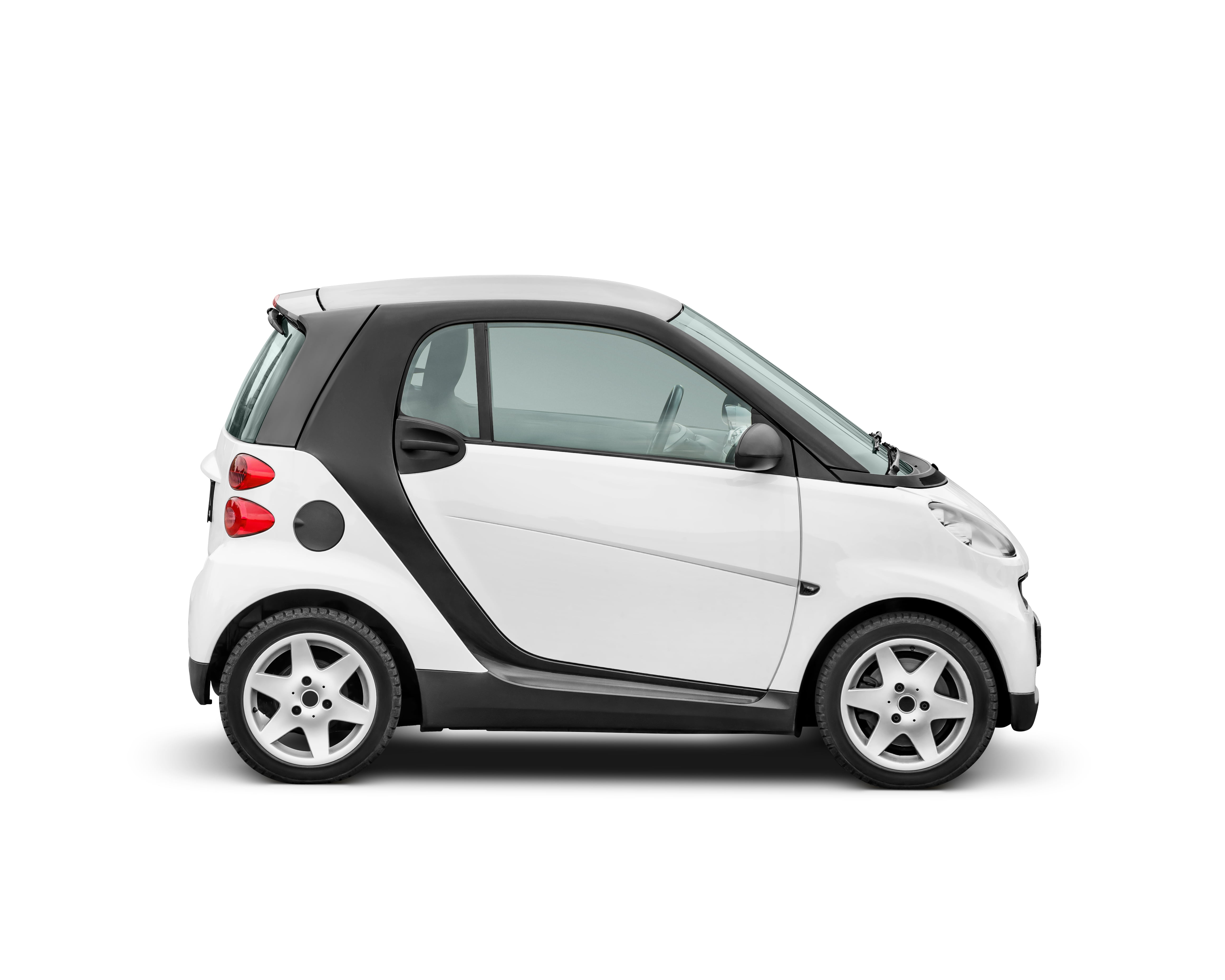 White small 2-occupant city car isolated on white background with clipping path.